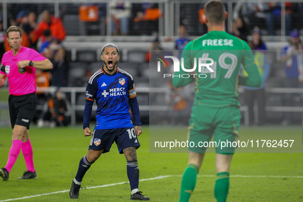 Luciano Acosta of Cincinnati reacts to New York City goalie Matt Freese after scoring on a penalty kick during the 2024 MLS Cup Playoffs Rou...