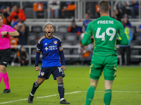 Luciano Acosta of Cincinnati reacts to New York City goalie Matt Freese after scoring on a penalty kick during the 2024 MLS Cup Playoffs Rou...