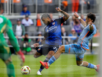 DeAndre Yedlin of Cincinnati takes a shot on goal during the 2024 MLS Cup Playoffs Round One match between FC Cincinnati and New York City F...