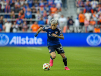 Luca Oreallano of Cincinnati moves the ball upfield during the 2024 MLS Cup Playoffs Round One match between FC Cincinnati and New York City...