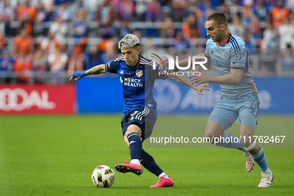 Luca Oreallano of Cincinnati moves the ball upfield during the 2024 MLS Cup Playoffs Round One match between FC Cincinnati and New York City...