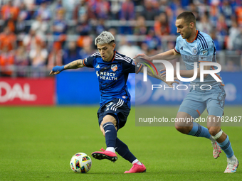 Luca Oreallano of Cincinnati moves the ball upfield during the 2024 MLS Cup Playoffs Round One match between FC Cincinnati and New York City...