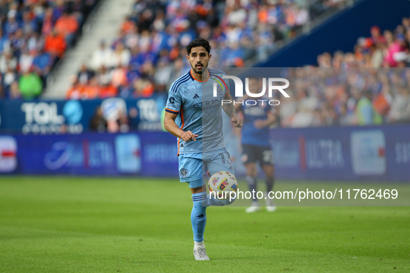 Thiago Martins moves the ball upfield during the 2024 MLS Cup Playoffs Round One match between FC Cincinnati and New York City FC at TQL Sta...