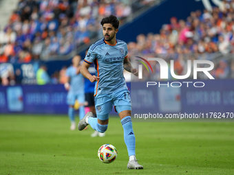 Thiago Martins moves the ball upfield during the 2024 MLS Cup Playoffs Round One match between FC Cincinnati and New York City FC at TQL Sta...