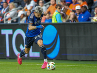 Luca Orellano of Cincinnati moves the ball upfield during the 2024 MLS Cup Playoffs Round One match between FC Cincinnati and New York City...