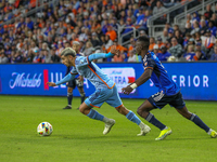 Santiago Rodriguez of New York moves the ball upfield during the 2024 MLS Cup Playoffs Round One match between FC Cincinnati and New York Ci...