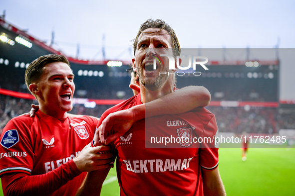 FC Twente forward Daan Rots and FC Twente midfielder Michel Vlap celebrate the 1-0 goal during the match between Twente and Ajax at the Grol...