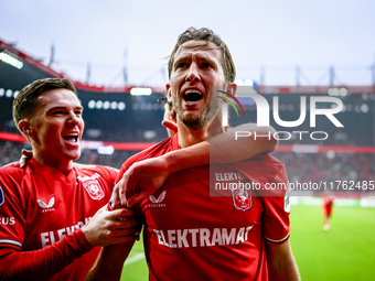 FC Twente forward Daan Rots and FC Twente midfielder Michel Vlap celebrate the 1-0 goal during the match between Twente and Ajax at the Grol...