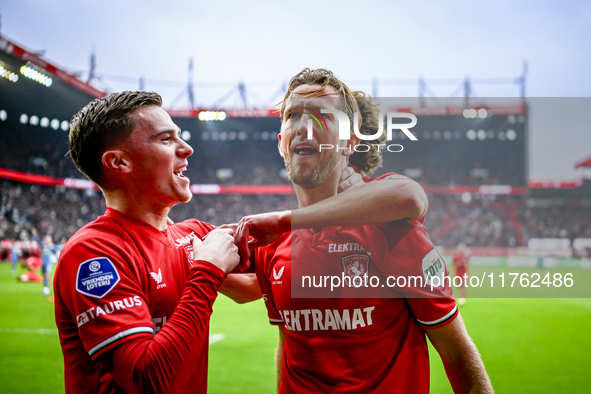 FC Twente forward Daan Rots and FC Twente midfielder Michel Vlap celebrate the 1-0 goal during the match between Twente and Ajax at the Grol...