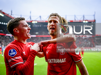 FC Twente forward Daan Rots and FC Twente midfielder Michel Vlap celebrate the 1-0 goal during the match between Twente and Ajax at the Grol...