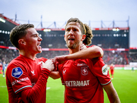 FC Twente forward Daan Rots and FC Twente midfielder Michel Vlap celebrate the 1-0 goal during the match between Twente and Ajax at the Grol...