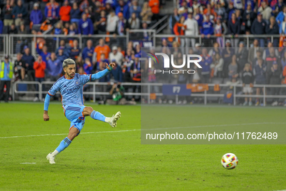 Santiago Rodriques of New York takes a penalty kick during the 2024 MLS Cup Playoffs Round One match between FC Cincinnati and New York City...