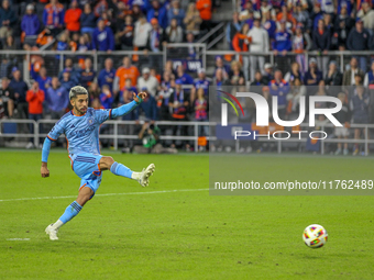 Santiago Rodriques of New York takes a penalty kick during the 2024 MLS Cup Playoffs Round One match between FC Cincinnati and New York City...