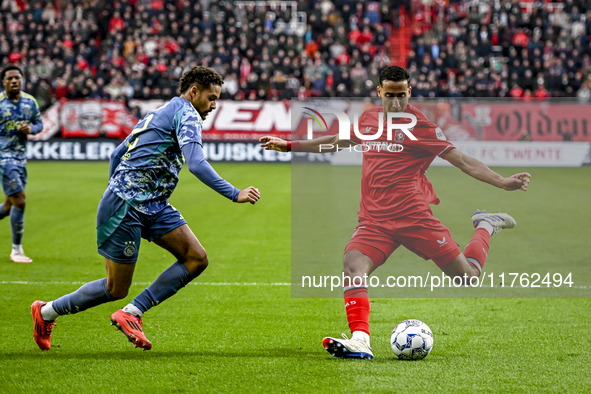 AFC Ajax Amsterdam defender Devyne Rensch and FC Twente defender Anass Salah-Eddine play during the match between Twente and Ajax at the Gro...