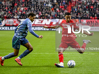 AFC Ajax Amsterdam defender Devyne Rensch and FC Twente defender Anass Salah-Eddine play during the match between Twente and Ajax at the Gro...