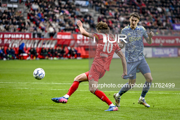 FC Twente forward Sam Lammers and AFC Ajax Amsterdam defender Youri Baas play during the match between Twente and Ajax at the Grolsch Veste...