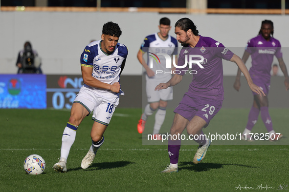 Yacine Adli of ACF Fiorentina and Abdou Harroui of Hellas Verona FC ,battle for the ball during the Italian Serie A football match between A...