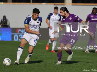 Yacine Adli of ACF Fiorentina and Abdou Harroui of Hellas Verona FC ,battle for the ball during the Italian Serie A football match between A...