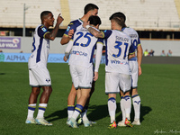 Suat Serdar of Hellas Verona FC celebrates with teammates after scoring  goal during  the Italian Serie A football match between ACF Fiorent...