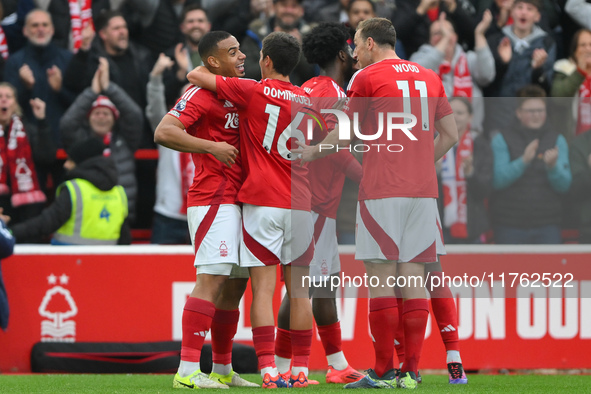 Murillo of Nottingham Forest celebrates with his teammates after scoring a goal during the Premier League match between Nottingham Forest an...