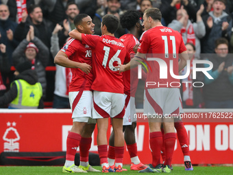 Murillo of Nottingham Forest celebrates with his teammates after scoring a goal during the Premier League match between Nottingham Forest an...