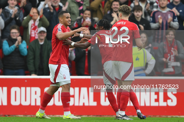 Murillo of Nottingham Forest celebrates with his teammates after scoring a goal during the Premier League match between Nottingham Forest an...