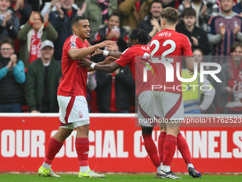 Murillo of Nottingham Forest celebrates with his teammates after scoring a goal during the Premier League match between Nottingham Forest an...