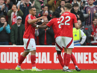 Murillo of Nottingham Forest celebrates with his teammates after scoring a goal during the Premier League match between Nottingham Forest an...