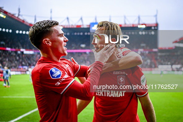 FC Twente forward Daan Rots and FC Twente midfielder Michel Vlap celebrate the 1-0 goal during the match between Twente and Ajax at the Grol...