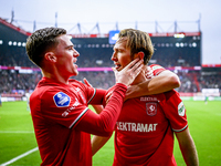 FC Twente forward Daan Rots and FC Twente midfielder Michel Vlap celebrate the 1-0 goal during the match between Twente and Ajax at the Grol...