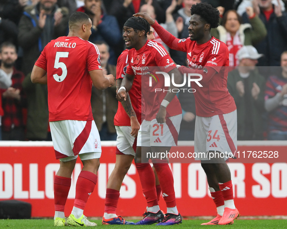 Murillo of Nottingham Forest celebrates with his teammates after scoring a goal during the Premier League match between Nottingham Forest an...