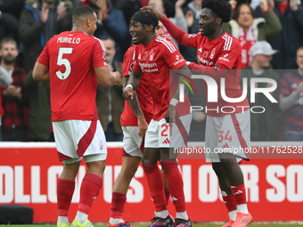 Murillo of Nottingham Forest celebrates with his teammates after scoring a goal during the Premier League match between Nottingham Forest an...