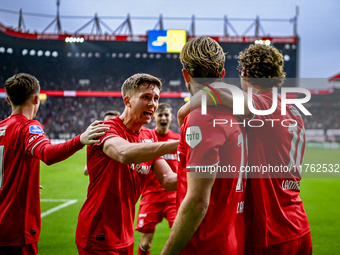 Players of FC Twente celebrate the goal by FC Twente midfielder Michel Vlap, making it 1-0, alongside FC Twente defender Max Bruns, during t...