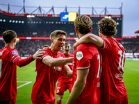 Players of FC Twente celebrate the goal by FC Twente midfielder Michel Vlap, making it 1-0, alongside FC Twente defender Max Bruns, during t...