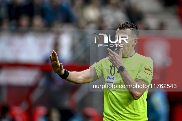 Referee Allard Lindhout officiates the match between Twente and Ajax at the Grolsch Veste Stadium for the Dutch Eredivisie season 2024-2025...