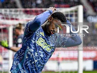 AFC Ajax Amsterdam defender Jorrel Hato plays during the match between Twente and Ajax at the Grolsch Veste stadium for the Dutch Eredivisie...