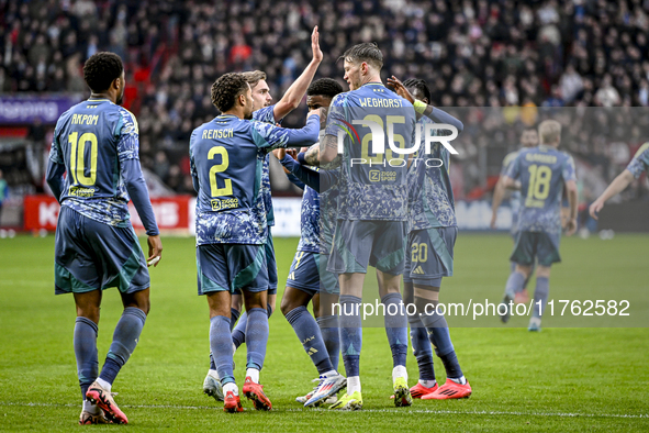 Players of Ajax celebrate the goal by AFC Ajax Amsterdam midfielder Davy Klaassen, making the score 1-1, during the match between Twente and...