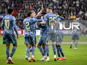 Players of Ajax celebrate the goal by AFC Ajax Amsterdam midfielder Davy Klaassen, making the score 1-1, during the match between Twente and...