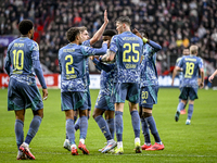 Players of Ajax celebrate the goal by AFC Ajax Amsterdam midfielder Davy Klaassen, making the score 1-1, during the match between Twente and...