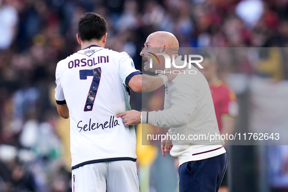 Vincenzo Italiano head coach of Bologna FC gives instructions to Riccardo Orsolini of Bologna FC during the Serie A Enilive match between AS...