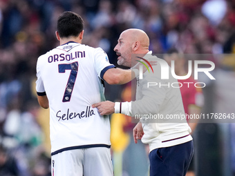 Vincenzo Italiano head coach of Bologna FC gives instructions to Riccardo Orsolini of Bologna FC during the Serie A Enilive match between AS...