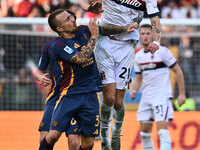 Angelino of A.S. Roma and Jens Odgaard of Bologna F.C. are in action during the 12th day of the Serie A Championship between A.S. Roma and B...