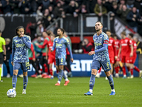 AFC Ajax Amsterdam midfielders Jordan Henderson and Kian Fitz-Jim are disappointed after the goal by FC Twente midfielder Michel Vlap, makin...