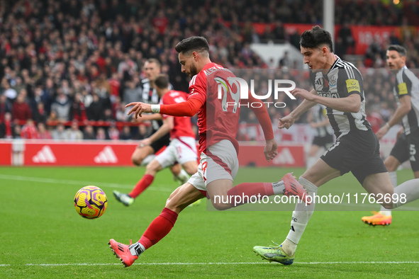 Alex Moreno of Nottingham Forest lines up a cross during the Premier League match between Nottingham Forest and Newcastle United at the City...