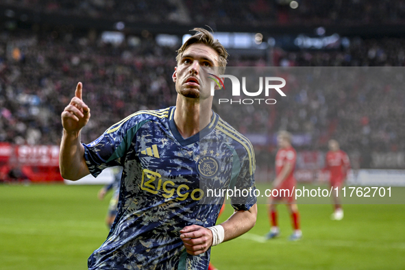 AFC Ajax Amsterdam midfielder Kenneth Taylor celebrates the goal of AFC Ajax Amsterdam forward Bertrand Traore, making the score 2-2, during...