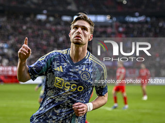 AFC Ajax Amsterdam midfielder Kenneth Taylor celebrates the goal of AFC Ajax Amsterdam forward Bertrand Traore, making the score 2-2, during...