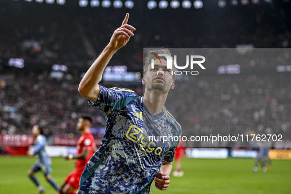 AFC Ajax Amsterdam midfielder Kenneth Taylor celebrates the goal of AFC Ajax Amsterdam forward Bertrand Traore, making the score 2-2, during...