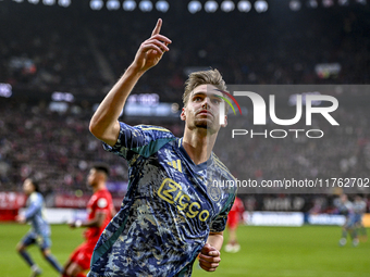 AFC Ajax Amsterdam midfielder Kenneth Taylor celebrates the goal of AFC Ajax Amsterdam forward Bertrand Traore, making the score 2-2, during...