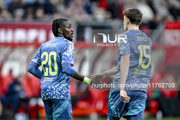 AFC Ajax Amsterdam forward Bertrand Traore and AFC Ajax Amsterdam defender Youri Baas celebrate the 2-2 goal during the match between Twente...