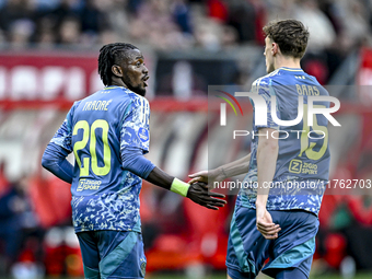 AFC Ajax Amsterdam forward Bertrand Traore and AFC Ajax Amsterdam defender Youri Baas celebrate the 2-2 goal during the match between Twente...